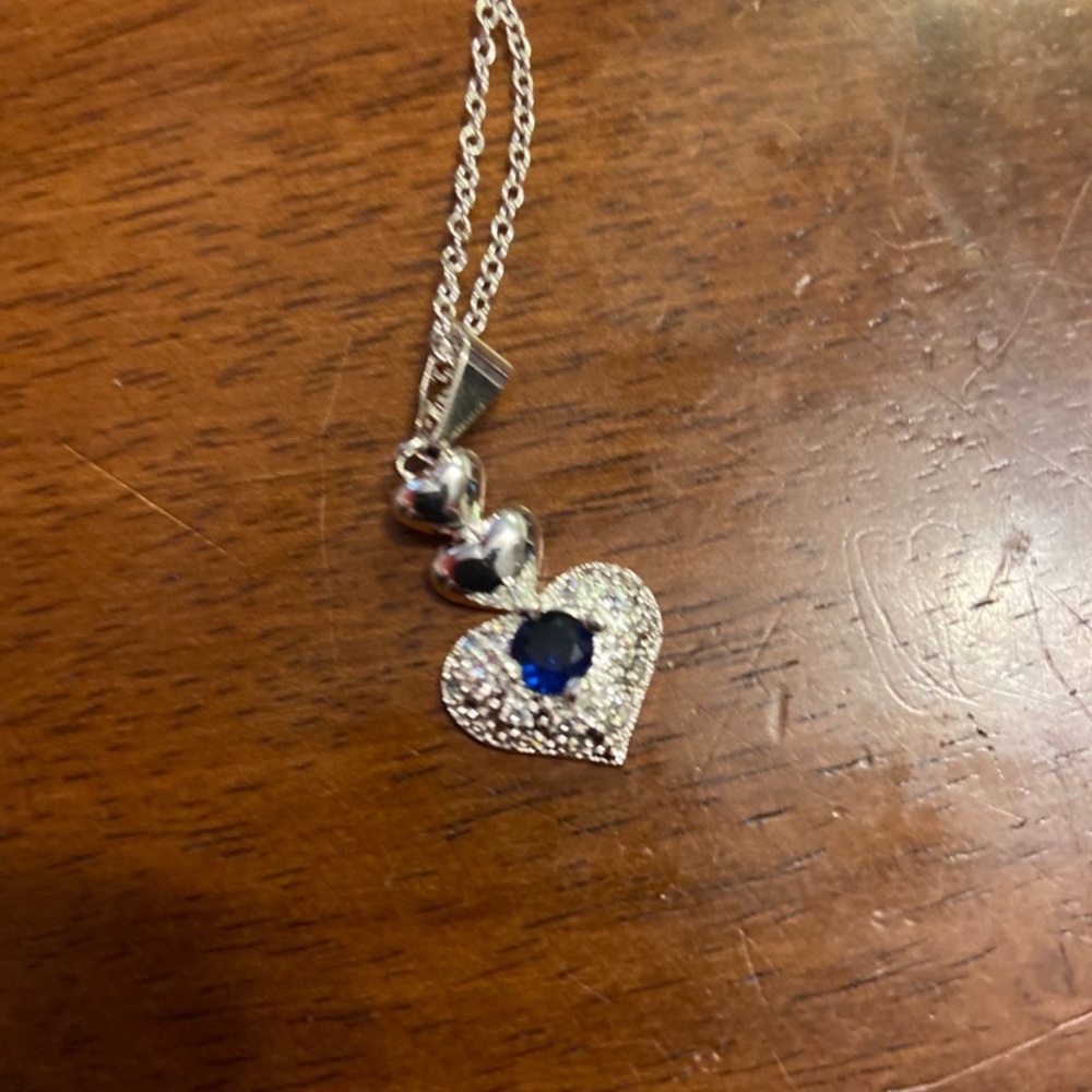 NWT heart shaped pendant with faux sapphire